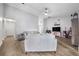 Spacious living room with wood floors, vaulted ceilings, and ample seating at 7120 Summit Dr, Winter Haven, FL 33884