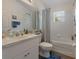 Full bathroom featuring a vanity, toilet, bath and shower combo at 799 Highland Crest Loop, Lake Wales, FL 33853