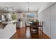 Cozy dining area off kitchen with backyard view at 799 Highland Crest Loop, Lake Wales, FL 33853
