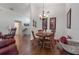 Traditional dining room with hardwood floors, chandelier lighting, and elegant decor at 799 Highland Crest Loop, Lake Wales, FL 33853