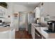 Bright kitchen featuring stainless steel appliances, white cabinets, and ample counter space at 799 Highland Crest Loop, Lake Wales, FL 33853