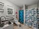 Quirky bathroom with playful fish shower curtain and stainless steel sink at 803 7Th Ne St, Fort Meade, FL 33841
