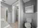 Bathroom featuring a toilet and vanity with ample storage space at 803 7Th Ne St, Fort Meade, FL 33841