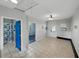 Spacious bonus room leads to a restroom and another room with wood-like flooring at 803 7Th Ne St, Fort Meade, FL 33841