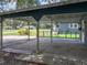 View from under the carport, looking out to the street, ample space and shelter at 803 7Th Ne St, Fort Meade, FL 33841