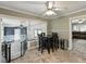 Cozy dining area with a view into another sitting room and seating for four at 803 7Th Ne St, Fort Meade, FL 33841