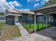 Charming home with a carport, and an artificial grass area at 803 7Th Ne St, Fort Meade, FL 33841