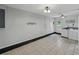 Bright laundry room featuring tile floors, modern appliances, and direct access to the backyard at 803 7Th Ne St, Fort Meade, FL 33841