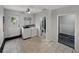 Functional laundry room features washer, dryer, and easy access to a restroom at 803 7Th Ne St, Fort Meade, FL 33841