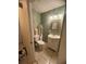 Bathroom with modern fixtures, a toilet, and built-in shelving at 808 Ware Ne Ave, Winter Haven, FL 33881