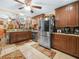 Well-equipped kitchen with stainless steel appliances, granite countertops, and stylish backsplash at 808 Ware Ne Ave, Winter Haven, FL 33881