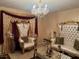 Beautiful living room featuring exquisite furniture, ornate details, and eye-catching chandelier at 808 Ware Ne Ave, Winter Haven, FL 33881