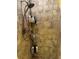 Shower featuring neutral tile and convenient shelving for toiletries at 808 Ware Ne Ave, Winter Haven, FL 33881