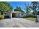 Charming single-story home featuring a convenient carport and ample parking at 825 Augusta St, Lakeland, FL 33805