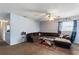 The living room features neutral paint and carpet with an open floor plan design at 825 Augusta St, Lakeland, FL 33805