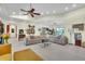 Inviting living room with tile floors, recessed lighting, a ceiling fan, and thoughtfully curated décor at 9950 W Lake Marion Rd, Haines City, FL 33844