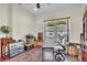 Bright office space with a ceiling fan, large window view, and decorated with multiple antique pieces at 9950 W Lake Marion Rd, Haines City, FL 33844