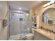 Bathroom features a glass enclosed shower, built in shower seat and storage cabinet at 101 Babson Heights Dr, Babson Park, FL 33827