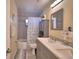 Bathroom featuring a double sink vanity with modern fixtures, neutral color scheme, and shower/tub combination at 101 Babson Heights Dr, Babson Park, FL 33827