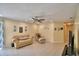 Spacious living room with recessed lighting, tile flooring and updated ceiling fan at 101 Babson Heights Dr, Babson Park, FL 33827