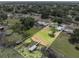 Aerial view outlining the property with docks, lake, and a home at 1010 Biltmore Nw Dr, Winter Haven, FL 33881