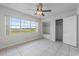Bedroom offers natural light and closet space at 1010 Biltmore Nw Dr, Winter Haven, FL 33881