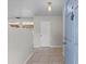 Inviting foyer with tiled flooring, neutral walls, and access to the rest of the house at 1010 Biltmore Nw Dr, Winter Haven, FL 33881