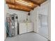 Utility room with washer and dryer and new Performance Platinum water heater at 1010 Biltmore Nw Dr, Winter Haven, FL 33881