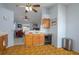 Bright kitchen overlooking the living room and dining area at 1055 Sunshine Sw Way, Winter Haven, FL 33880
