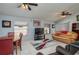 Cozy living room and dining area with tile floors and ample natural light at 1055 Sunshine Sw Way, Winter Haven, FL 33880