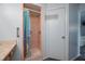 Bathroom featuring tile shower at 1055 Sunshine Sw Way, Winter Haven, FL 33880