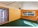 Bonus room with a ceiling fan, green carpet, and a window at 1163 Lake Dr, Lake Wales, FL 33859