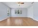 Spacious bedroom with wood-look flooring, neutral walls, and ample natural light at 1226 Lake Loop, Winter Haven, FL 33880