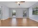 Large bedroom with neutral walls, wood-look floors, and large windows for plenty of light at 1226 Lake Loop, Winter Haven, FL 33880