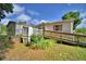 Backyard and deck and handicap ramp at 1294 1/2 38Th Nw St, Winter Haven, FL 33881