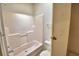 Bathroom features a shower and tub combination with a standard toilet at 1294 1/2 38Th Nw St, Winter Haven, FL 33881