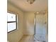 Small bathroom featuring tile flooring, toilet, and shower stall at 1294 1/2 38Th Nw St, Winter Haven, FL 33881