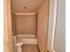 Bathroom featuring a tiled shower-tub, a toilet, and vanity at 1294 1/2 38Th Nw St, Winter Haven, FL 33881