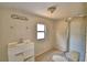 Small bathroom featuring tile flooring, toilet, vanity, and shower stall at 1294 1/2 38Th Nw St, Winter Haven, FL 33881