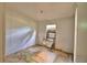 Bedroom needing repair, window view, with exposed wall and floor at 1294 1/2 38Th Nw St, Winter Haven, FL 33881