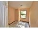 Bedroom with a closet, and one window providing natural light at 1294 1/2 38Th Nw St, Winter Haven, FL 33881