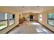 Kitchen and dining area with tile floors, basic appliances, and natural light at 1294 1/2 38Th Nw St, Winter Haven, FL 33881