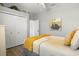 Bright bedroom with a decorative bed, wood-look flooring and a closet at 135 Minniehaha Cir, Haines City, FL 33844