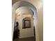 Entryway features arched doorways and decorative art at 135 Minniehaha Cir, Haines City, FL 33844