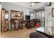 Game room with an arcade game and comfortable seating near a window at 135 Minniehaha Cir, Haines City, FL 33844