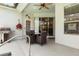 The patio has comfortable seating, ideal for outdoor relaxation and dining at 135 Minniehaha Cir, Haines City, FL 33844