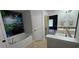 Bathroom featuring a soaking tub, walk-in shower, double vanity, and tile floors at 1400 Eagle Crest Blvd, Winter Haven, FL 33881