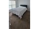 Bright bedroom with neutral carpet and natural light from window at 1400 Eagle Crest Blvd, Winter Haven, FL 33881