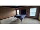 Bedroom features carpet, tray ceilings, two windows, and unique overhead lighting at 1400 Eagle Crest Blvd, Winter Haven, FL 33881