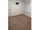 Bedroom featuring neutral colored carpet, window, and blank wall at 1400 Eagle Crest Blvd, Winter Haven, FL 33881